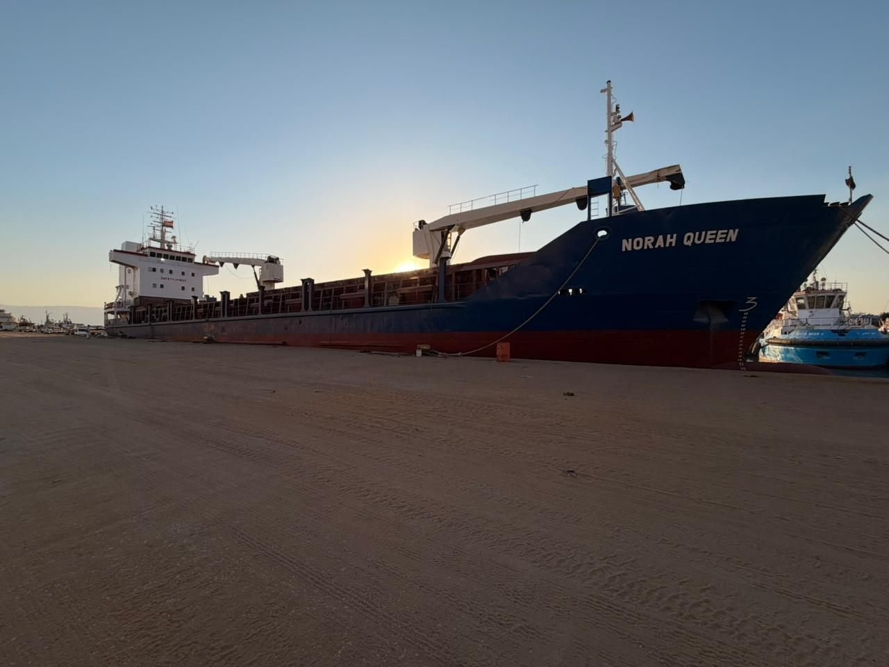 MV Norah Queen alongside at sunset, starboard profile